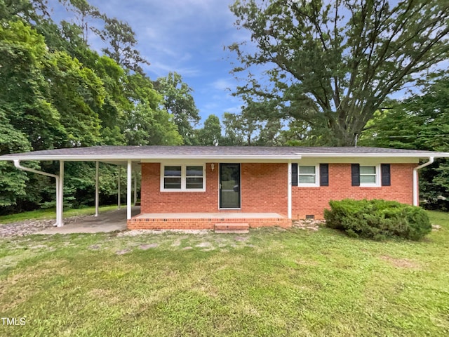 1311 Meadow Ln, Chapel Hill, NC 27516 - ranch-style home with brick siding, a front lawn, covered porch, and crawl space