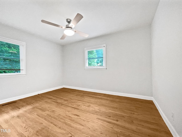 1311 Meadow Ln, Chapel Hill, NC 27516 - unfurnished room with wood finished floors, baseboards, and a ceiling fan