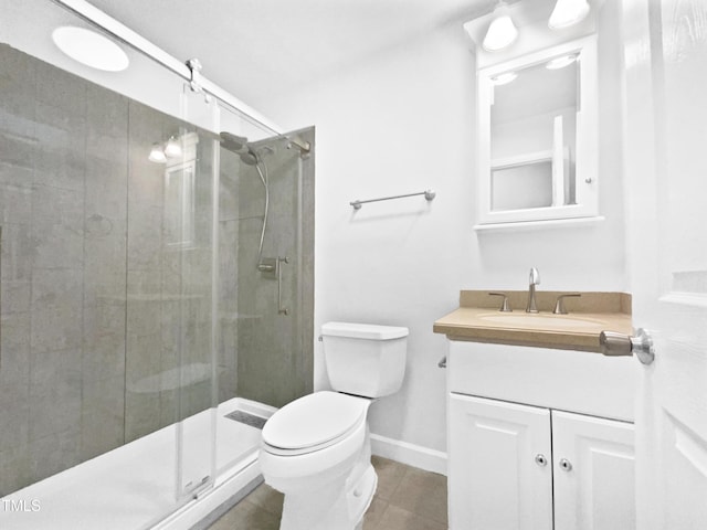 1311 Meadow Ln, Chapel Hill, NC 27516 - full bathroom with toilet, vanity, a stall shower, and tile patterned floors