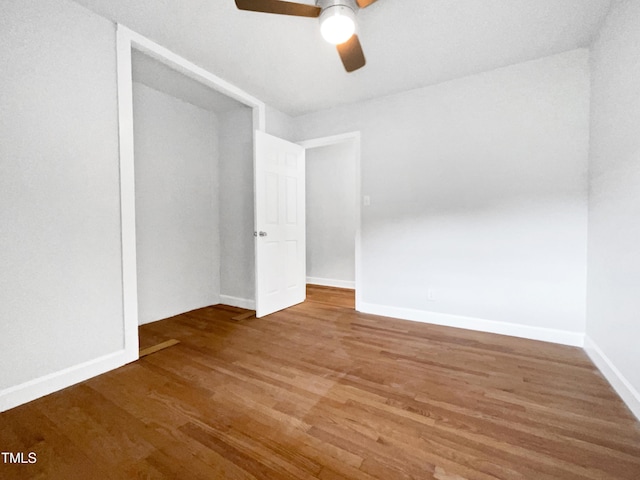 1311 Meadow Ln, Chapel Hill, NC 27516 - unfurnished room with a ceiling fan, wood finished floors, and baseboards