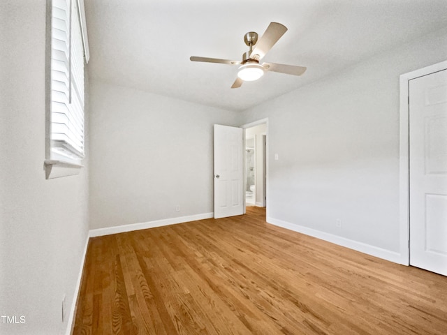 1311 Meadow Ln, Chapel Hill, NC 27516 - unfurnished room with light wood finished floors, ceiling fan, and baseboards