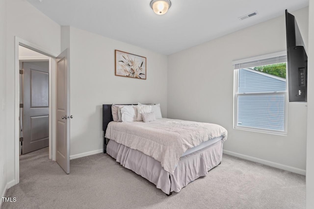 509 Rain Drizzle Ct, Wake Forest, NC 27587 - bedroom featuring light colored carpet and baseboards