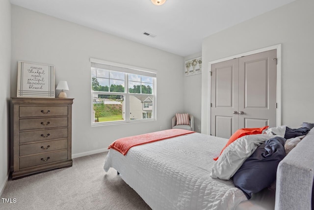 509 Rain Drizzle Ct, Wake Forest, NC 27587 - carpeted bedroom featuring baseboards and a closet