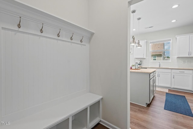 509 Rain Drizzle Ct, Wake Forest, NC 27587 - mudroom featuring wood finished floors and recessed lighting