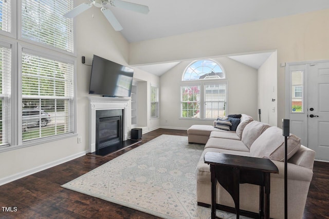 1406 Pebble Creek Xing, Durham, NC 27713 - living area featuring vaulted ceiling, dark wood finished floors, a ceiling fan, and a glass covered fireplace