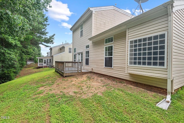 1406 Pebble Creek Xing, Durham, NC 27713 - back of property featuring a wooden deck and a yard