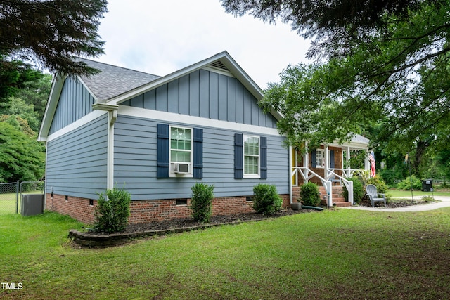 1008 Catsby Cir, Raleigh, NC 27603 - view of front of home with crawl space, board and batten siding, covered porch, and a shingled roof