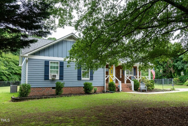 1008 Catsby Cir, Raleigh, NC 27603 - view of front facade with board and batten siding and roof with shingles