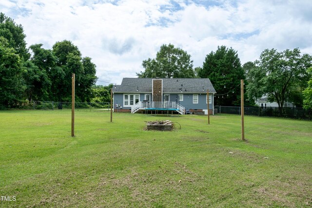 1008 Catsby Cir, Raleigh, NC 27603 - view of yard with a deck and an outdoor fire pit