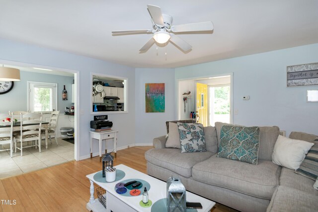 1008 Catsby Cir, Raleigh, NC 27603 - living area with ceiling fan and light wood-style flooring