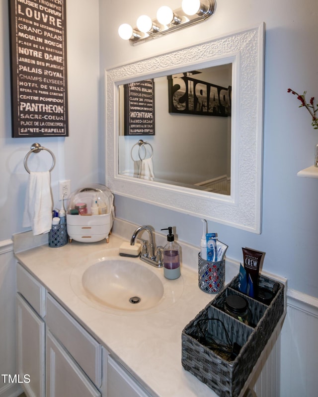 1008 Catsby Cir, Raleigh, NC 27603 - bathroom with vanity and a wainscoted wall
