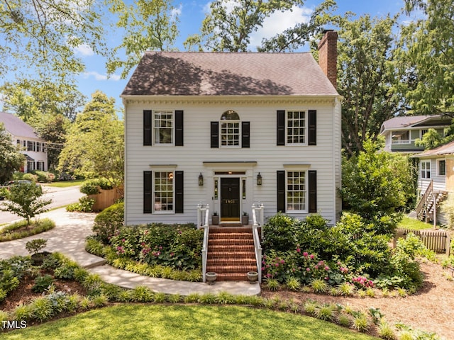 1901 White Oak Rd, Raleigh, NC 27608 - view of front of home with a chimney and a shingled roof