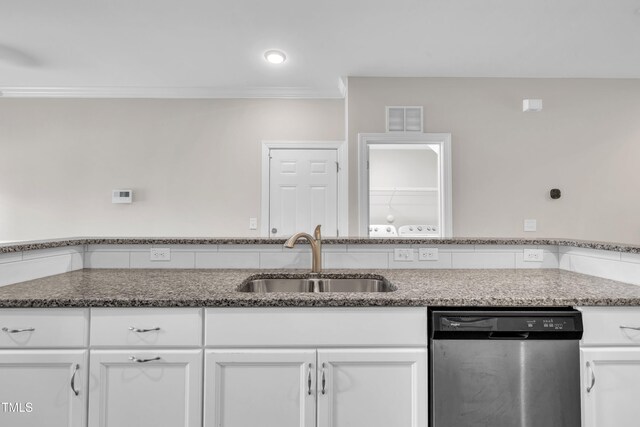 656 Barneswyck Dr, Fuquay Varina, NC 27526 - kitchen with stainless steel dishwasher, ornamental molding, white cabinetry, and dark stone counters