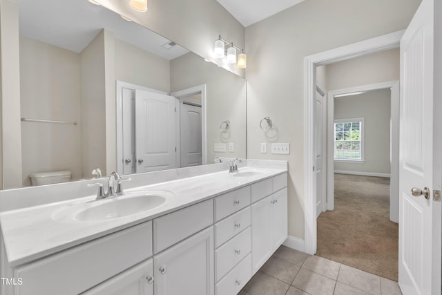 656 Barneswyck Dr, Fuquay Varina, NC 27526 - bathroom featuring double vanity and tile patterned floors