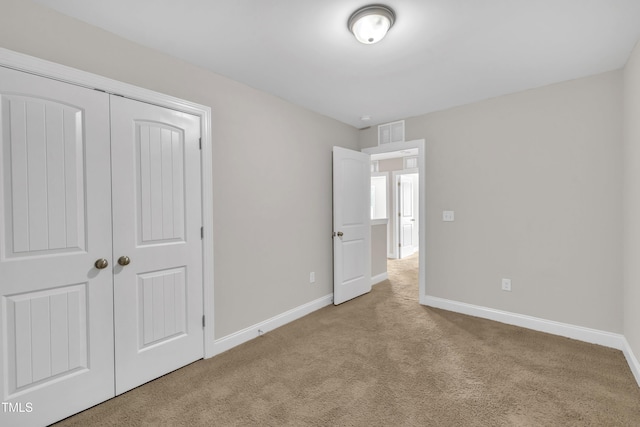 656 Barneswyck Dr, Fuquay Varina, NC 27526 - unfurnished bedroom featuring carpet flooring and a closet
