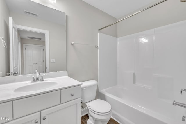 656 Barneswyck Dr, Fuquay Varina, NC 27526 - bathroom featuring vanity, washtub / shower combination, and wood finished floors