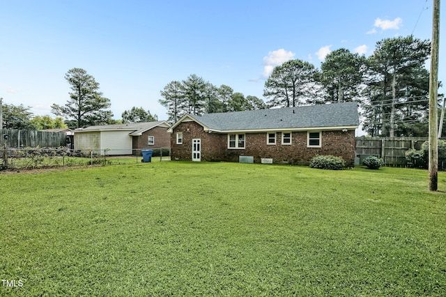 106 Grace Dr NW, Wilson, NC 27896 - rear view of house with brick siding