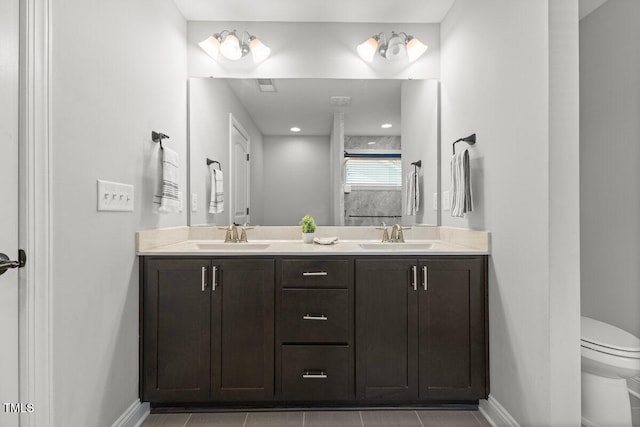 509 Holden Forest Dr, Youngsville, NC 27596 - full bathroom featuring double vanity and tile patterned flooring