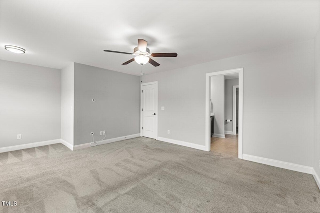 509 Holden Forest Dr, Youngsville, NC 27596 - carpeted empty room featuring a ceiling fan and baseboards