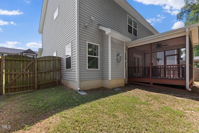 509 Holden Forest Dr, Youngsville, NC 27596 - rear view of house featuring a ceiling fan and a sunroom