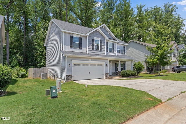 509 Holden Forest Dr, Youngsville, NC 27596 - view of front facade with concrete driveway, a garage, and stone siding