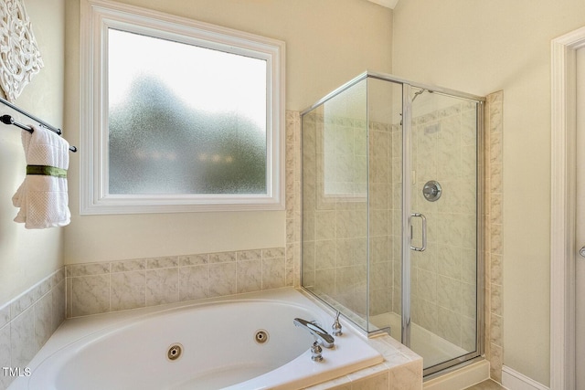 2311 Woodwyck Way, Raleigh, NC 27604 - full bath with plenty of natural light, a shower stall, and a jetted tub
