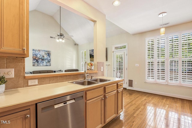 2311 Woodwyck Way, Raleigh, NC 27604 - kitchen featuring stainless steel dishwasher, lofted ceiling, light wood finished floors, light countertops, and a ceiling fan
