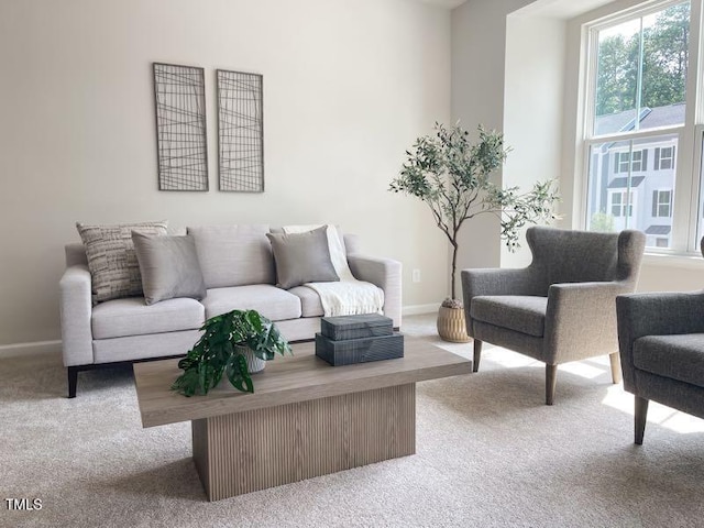 1359 Chowan Ave, Durham, NC 27713 - carpeted living room featuring baseboards