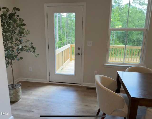 1359 Chowan Ave, Durham, NC 27713 - entryway featuring light wood-style floors and baseboards