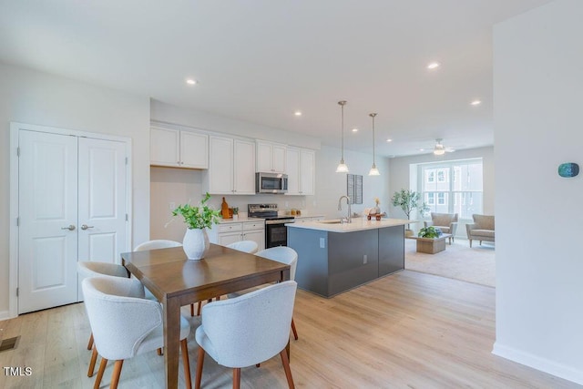 1359 Chowan Ave, Durham, NC 27713 - dining space with light wood-style flooring, recessed lighting, and a ceiling fan
