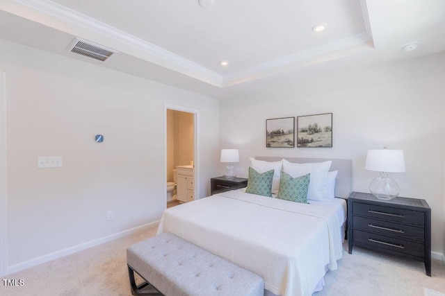 1359 Chowan Ave, Durham, NC 27713 - bedroom with light colored carpet, a raised ceiling, recessed lighting, and ensuite bathroom