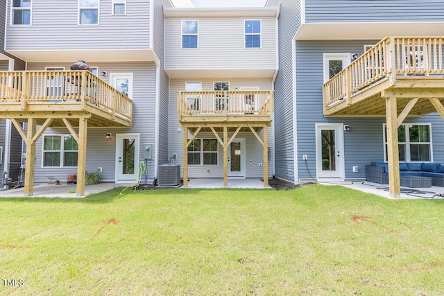 1359 Chowan Ave, Durham, NC 27713 - rear view of property with a lawn, a patio, and outdoor lounge area