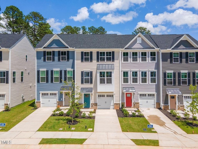 1359 Chowan Ave, Durham, NC 27713 - multi unit property featuring driveway, stone siding, and a garage