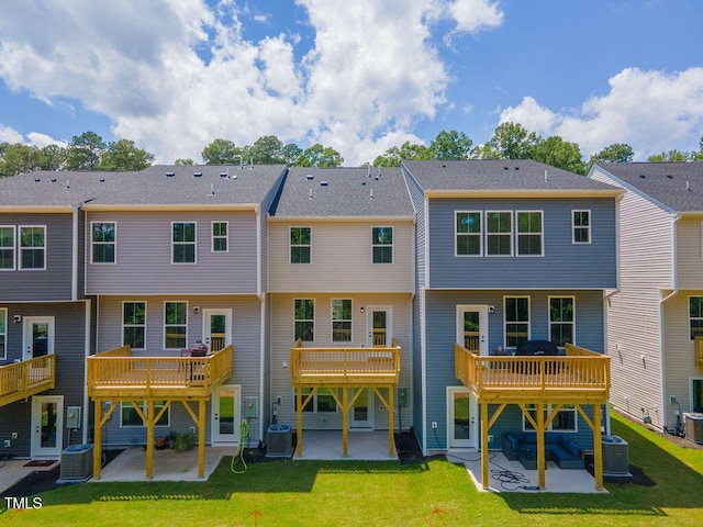 1359 Chowan Ave, Durham, NC 27713 - rear view of house with a patio and a yard