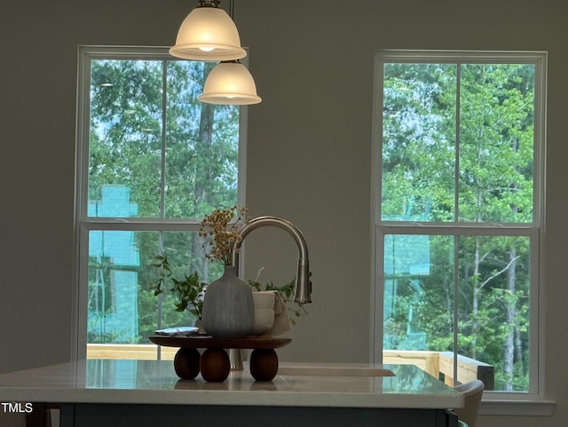 1359 Chowan Ave, Durham, NC 27713 - detailed view of light stone countertops and decorative light fixtures