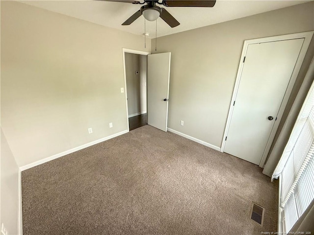 5692 Archer Rd, Hope Mills, NC 28348 - unfurnished bedroom featuring carpet flooring and ceiling fan