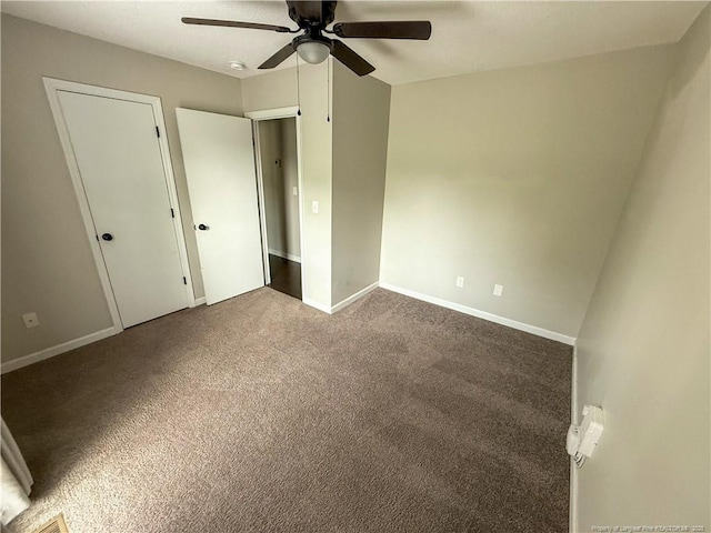 5692 Archer Rd, Hope Mills, NC 28348 - unfurnished bedroom with carpet flooring and ceiling fan