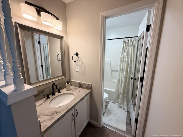 5692 Archer Rd, Hope Mills, NC 28348 - bathroom with toilet, vanity, and shower / bath combination with curtain