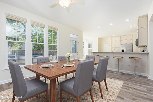 1613 Patterson Grove Rd, Apex, NC 27502 - dining room with light wood-style flooring, ceiling fan, recessed lighting, and baseboards