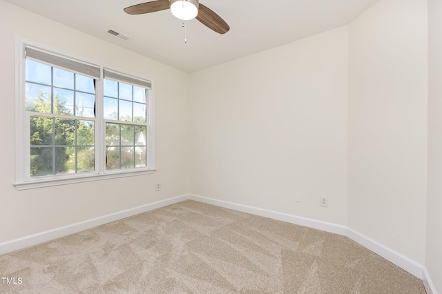 1613 Patterson Grove Rd, Apex, NC 27502 - carpeted spare room with baseboards and a ceiling fan