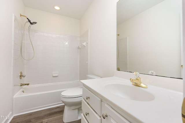 1613 Patterson Grove Rd, Apex, NC 27502 - full bath with wood finished floors, vanity, toilet, shower / washtub combination, and recessed lighting