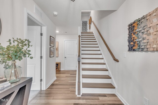 1729 Starlit Sky Ln, Cary, NC 27519 - staircase featuring wood finished floors and recessed lighting