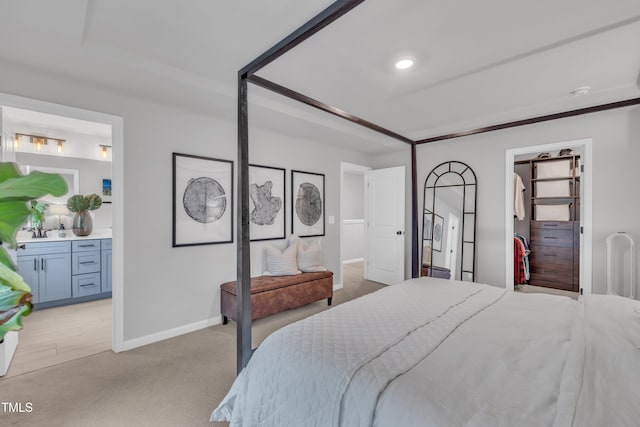 1729 Starlit Sky Ln, Cary, NC 27519 - bedroom featuring light carpet, ensuite bathroom, and recessed lighting