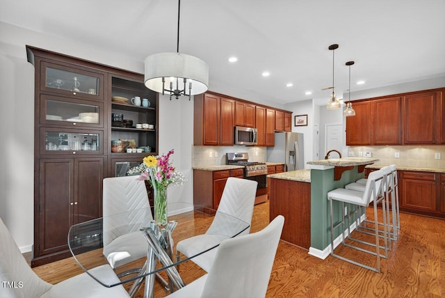 117 Sonoma Way, Chapel Hill, NC 27516 - dining space featuring recessed lighting, light wood-type flooring, and a chandelier