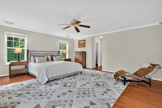 117 Sonoma Way, Chapel Hill, NC 27516 - bedroom with crown molding, wood finished floors, and ceiling fan