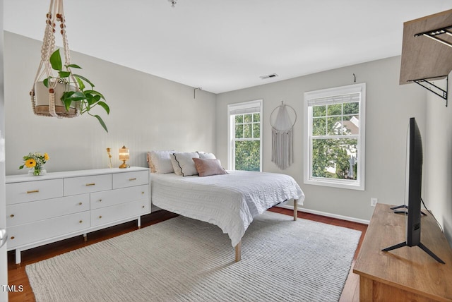 117 Sonoma Way, Chapel Hill, NC 27516 - bedroom with dark wood-style floors and baseboards