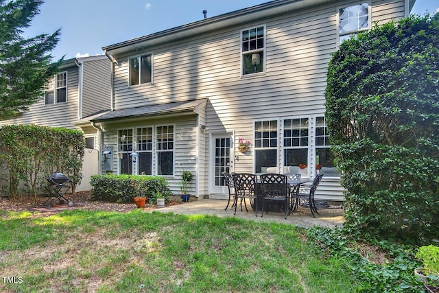 117 Sonoma Way, Chapel Hill, NC 27516 - back of property with a patio area and a lawn