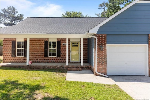 107 Beaumont Ct, Raeford, NC 28376 - view of front of property with brick siding, a garage, a porch, a front yard, and concrete driveway