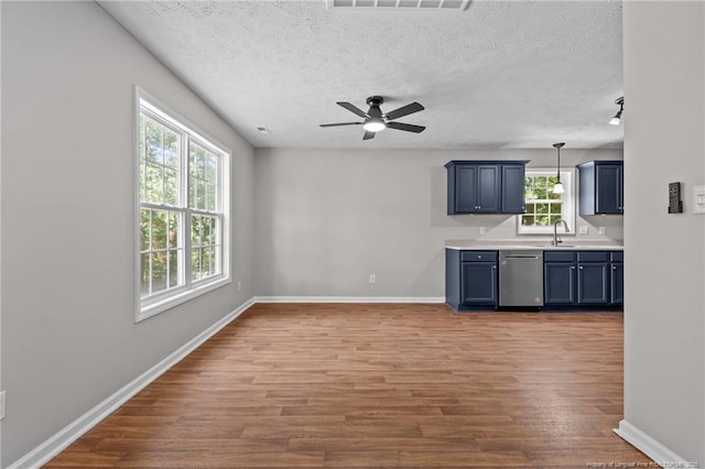 107 Beaumont Ct, Raeford, NC 28376 - kitchen featuring dishwasher, baseboards, wood finished floors, a sink, and ceiling fan