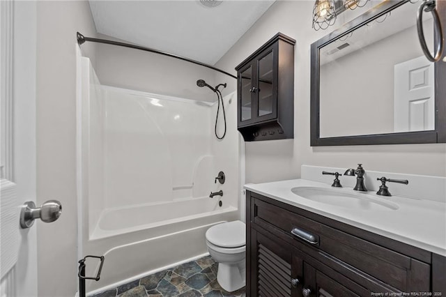 107 Beaumont Ct, Raeford, NC 28376 - bathroom with vanity, toilet,  shower combination, and stone finish flooring